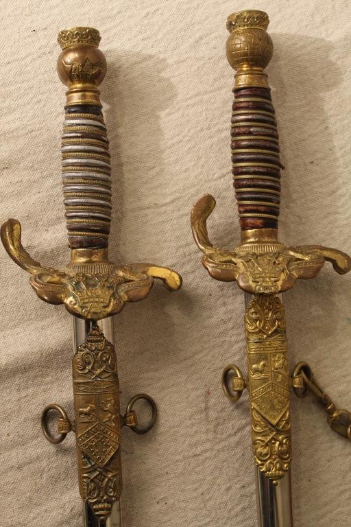 Pair Odd Fellows Patriarchs Militant Swords: Pair of Odd Fellows Patriarchs Militant ceremonial swords by The Henderson Ames Co. (marked on blades) with matching ornametal scabbards. Etching on both blades; belt included with lot. Some areas of 