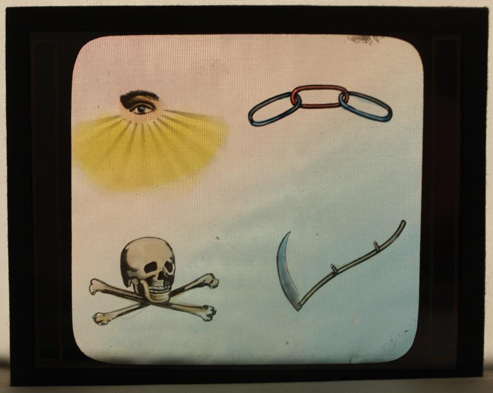 Group Odd Fellows Glass Stereopticon Slides: Group of 22 hand colored glass slides and 2 wood holders. Includes Odd Fellow symbols and biblical scenes. Some by Stereopticon & Film Exchange, Chicago, Ill. All very good condition. Early 20th C. Wo