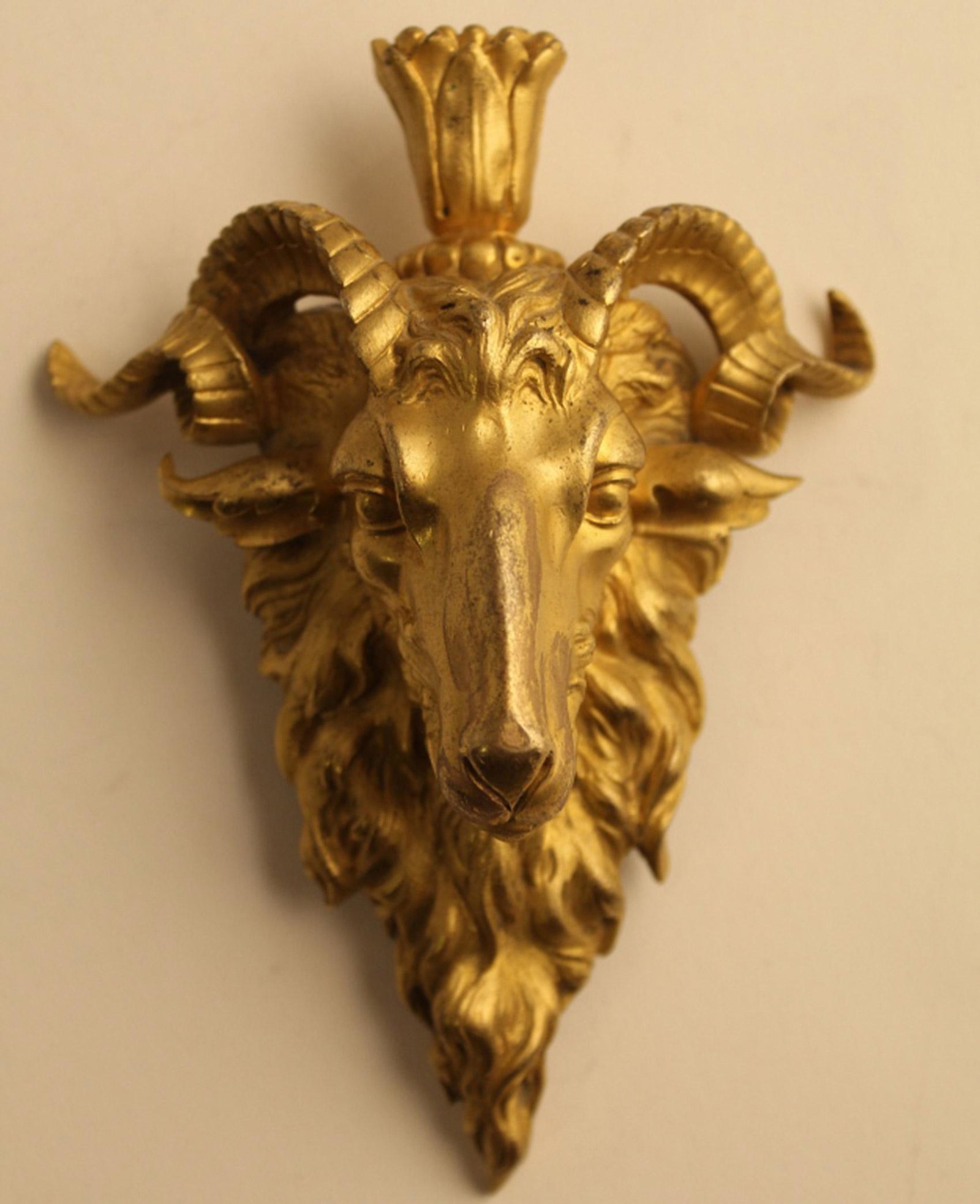 Antique Gilt Bronze Ormolu Ram's Head Mount: Heavy and well cast bronze with gilded finish. No apparent foundry maker's marks. Circa late 19th C.. Excellent condition. 5.75" H x 4.24" W.