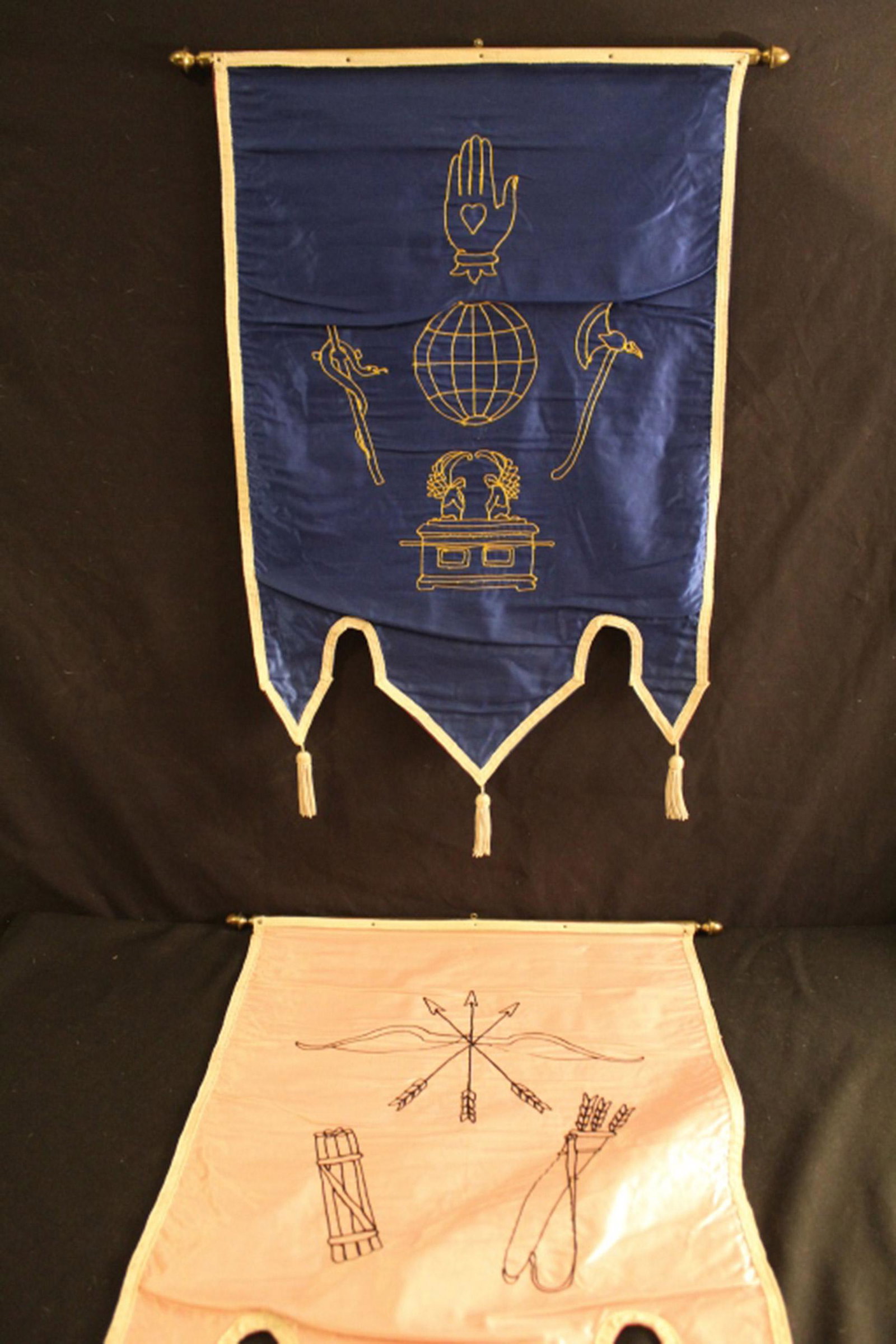 Pair Embroidered Odd Fellows Silk Hangings: Pair of Early 20th Century machine embroidered Odd Fellows silk wall hangings. Mounted on brass rod with acorn finials. In good vintage condition. Dimension 19 1/2"W x 28"L.