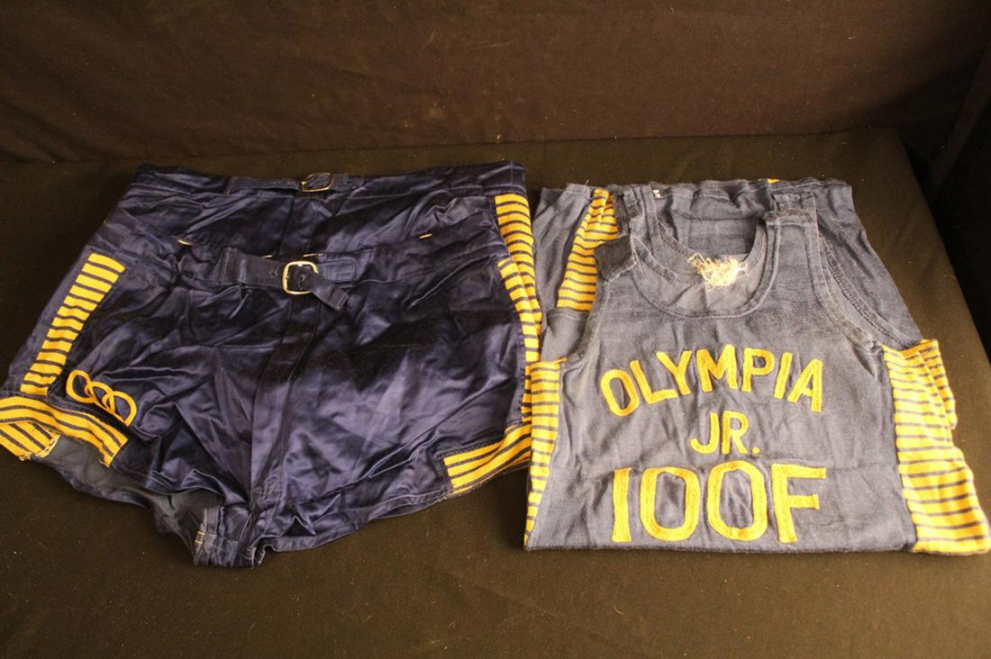 Pair Odd Fellows 1930's Basketball Uniforms: Pair of 1930's Jr Odd Fellows basketball uniforms; two pairs of satin shorts and tank tops with machine embroidery: numbers 12 and 16 on back of tank tops. In very good vintage condition with small ar