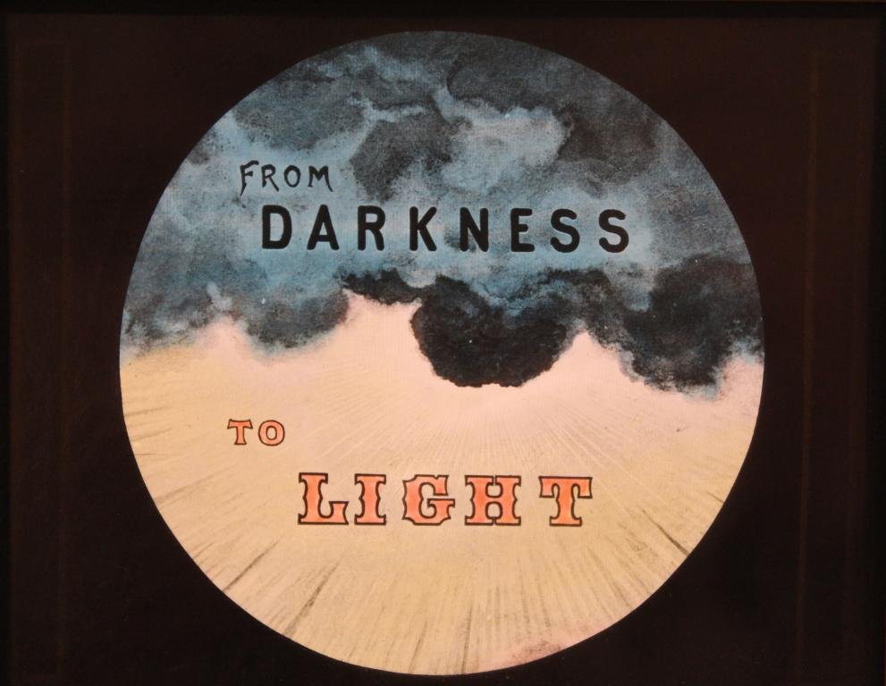 Antique Odd Fellows Magic Lantern Glass Slides: Group of 11 Odd Fellows hand colored glass slides in wood frames. Religious and landscape scenes (includes funeral slide). All very good condition. Late 19th/ early 20th C. All 4" x 7".