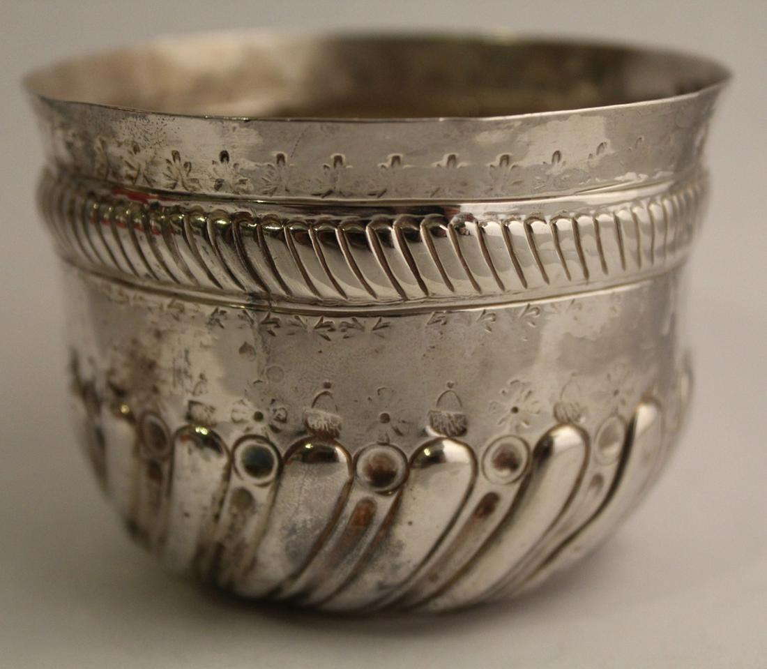 Antique English Silver Repousse Bowl 1887: Charles Stuart Harris small silver bowl with hand repousse and stamped designs. Hallmaked CSH, London marks, and M date mark for 1887. Good condition; signs of age wear, etc. 60 grams approx. 2 1/4" x