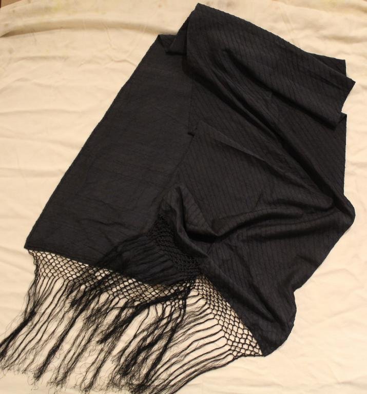 Oscar De La Renta Black Silk Scarf: Oscar de la Renta black silk scarf with sewn pleating and fringe. Original Oscar Made in India label. Excellent condition with no apparent snags, pulls, damage, etc.18"W x 74"L. approx.