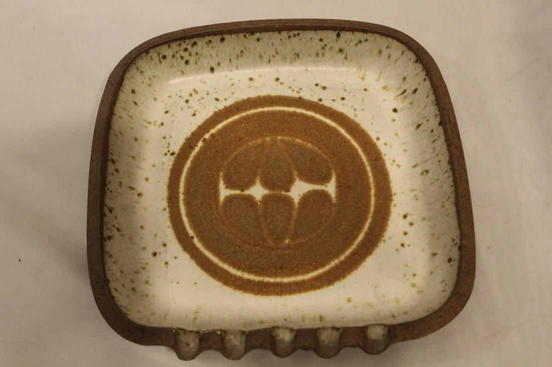 Vintage Ceramic Arts Calgary Pottery Ashtray: Hand formed pottery with CERAMIC ARTS CALGARY CANADA stamp. Excellent condition. Circa 1970's. 9.5" x 9.5".