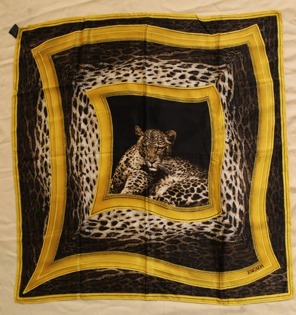 Escada Animal/ Leopard Print Silk Scarf: Vintage Escada silk scarf with leopard and gold border design. Hand rolled and stitched edges. Original Made in Italy labels. Very good condition with bright colors. No apparent snags, pulls, damage,