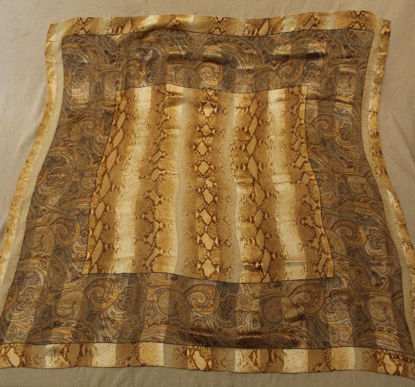 Escada Large Sheer Silk Scarf: Vintage Escada silk scarf with snake skin and paisley border design. Hand rolled and stitched edges. Very good condition with bright colors. No apparent snags, pulls, damage, etc. 54" x 54" approx.