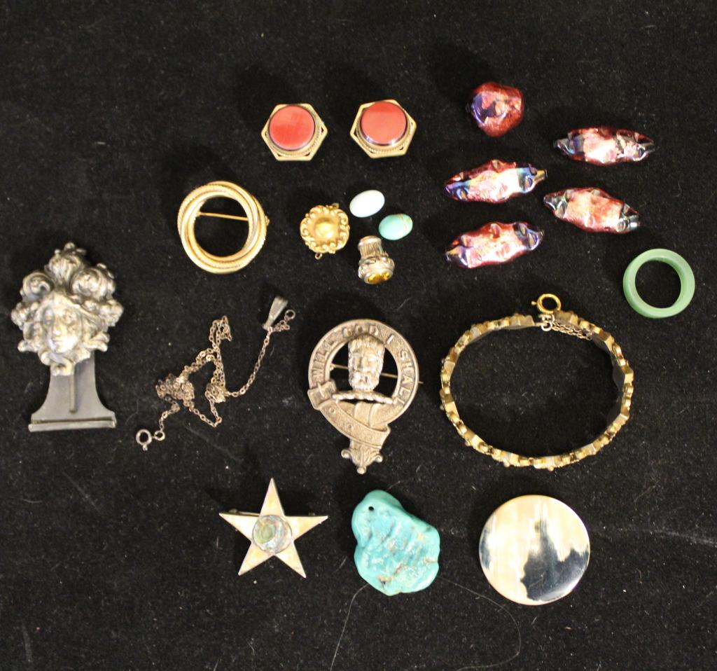 Vintage Costume Jewelry: Includes: Victorian brass bracelet. English motto pin. Circle brooch pin. Jade / green stone ring. Sterling and abalone star pin. Jeweley parts (chain, clasp, topper w/ rhinestone). Glass beads, penda