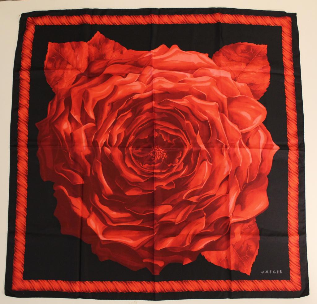 Jaeger Silk Scarf: Large red rose design on black background. Hand rolled and stitched edges. Original Made in Italy label. Excellent condition with bright colors. No apparent snags, pulls, damage, etc. 34" x 34" approx