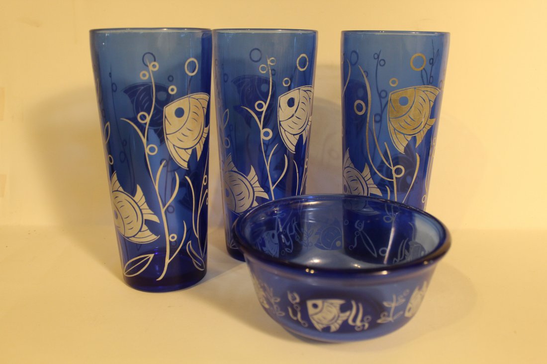 Hazel Atlas Cobalt Blue Cocktail Shakers and Bowl: Includes 3 cobalt blue 8 1/4" cocktail shakers and 3" H x 6" dia. bowl with angel fish designs. Good to fair condition.