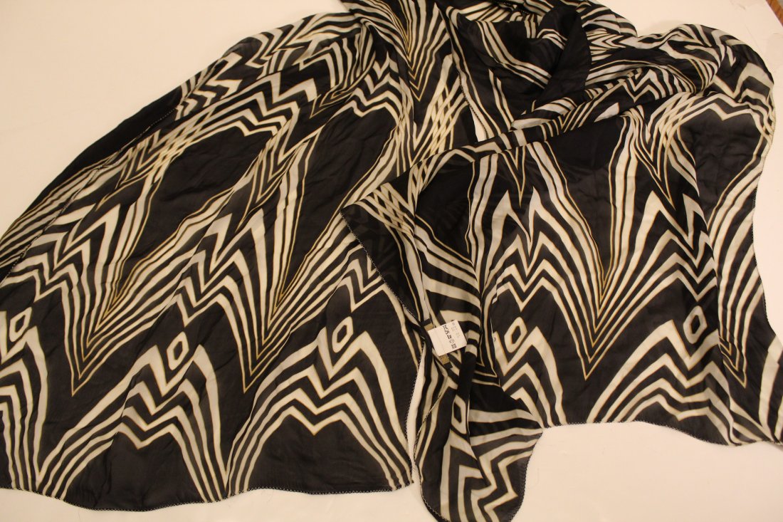 Roberto Cavalli Long Silk Scarf: Sheer silk with stylized Art Nouveau design. Original Made in Italy labels. Very good condition with no apparent snags, pulls, damage, etc. 25" x 104" approx.