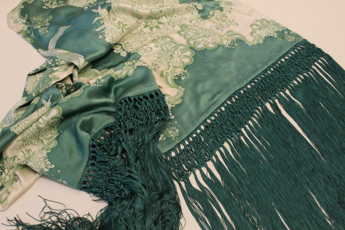 Roberto Cavalli Silk Scarf / Shawl: Green and cream antique floral design silk with 23" woven silk cord fringe at each end. Printed signature. Very good condition with no apparent snags, pulls, damage, etc. 22.5" W x 47" L (excluding fr