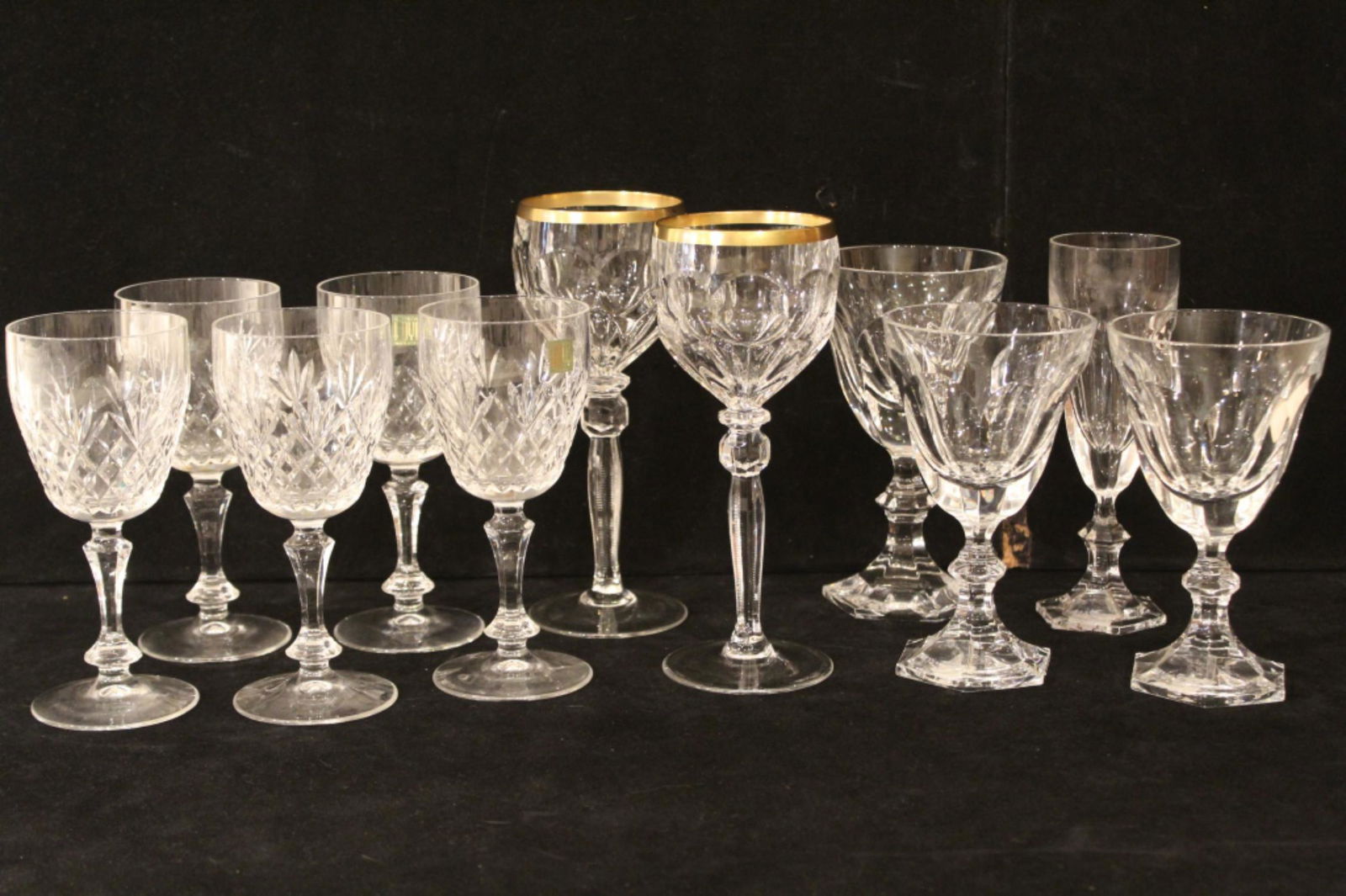 Royales de Champagne & Hoya Crystal Goblets: (1) Royales de Champagne Versailles pattern. Hand blown with panel cut bowls. Includes 7" champagne flute, 6 1/2" water goblet, and pair 6" wine glasses. Acid etched marks to bases. All in excellent l