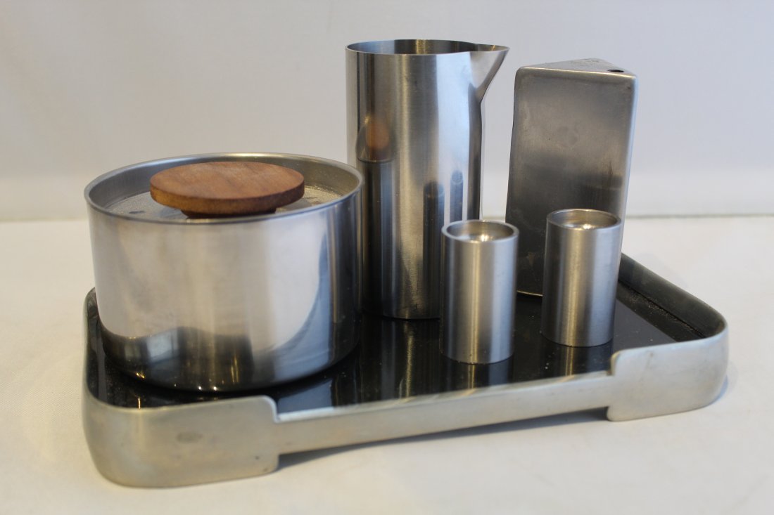 Stelton Cylindra Creamer / Selangor Mod Tray Etc.: (1) Stelton Cylindra-Line creamer designed by Arne Jacobsen. Very good condition. 3 3/4" H. (2) Cylinda-Line style salt and pepper shakers. Very good condition. 1 5/8" H. (3) Stainless lidded containe