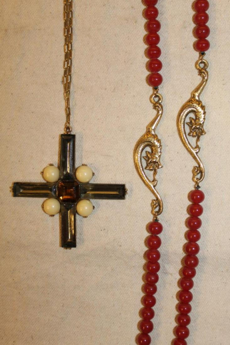 Vintage Anne Klein Necklace & Cross Pendant: (1) Anne Klein for Accessocraft Chinese style necklace with red glass beads and gold dragon spacers. 39" L. (2) Anne Klein for Accessocraft rhinestone and pearl cross pendant on chain. Pendant 3" x 3"
