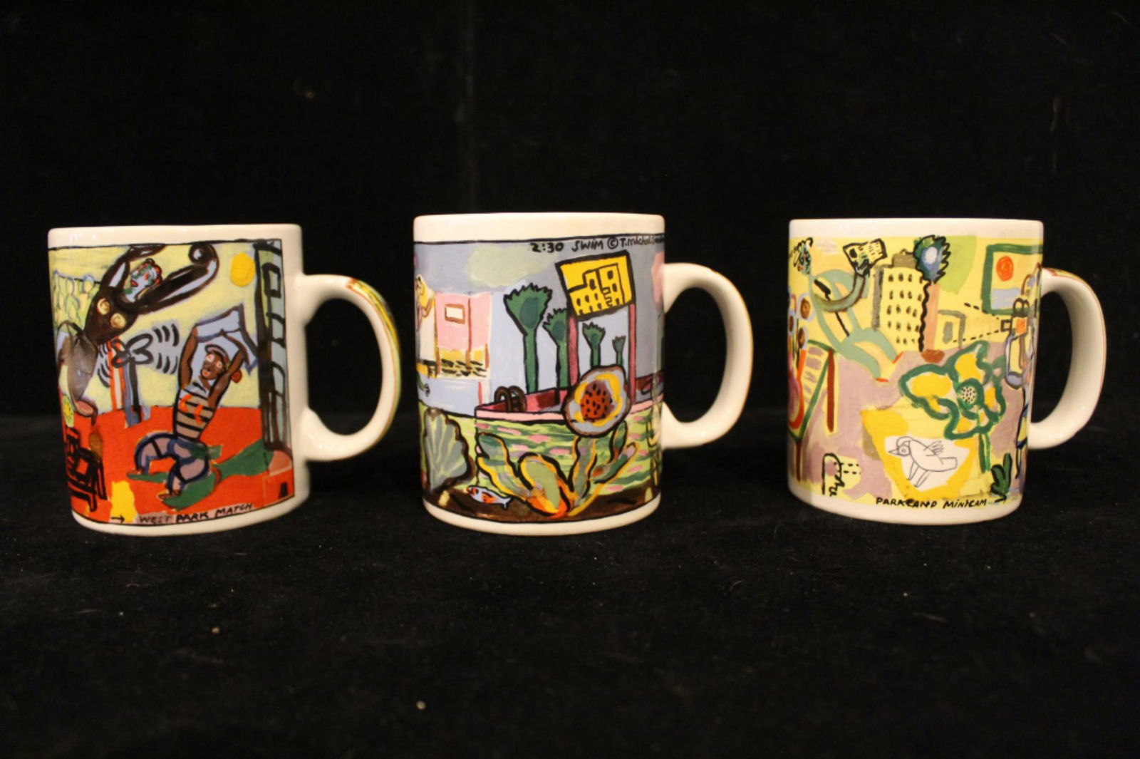 Chaleur Art Mugs by T. Michael Gardiner: Group of 3. Includes "Parkland Minicam", " West Park Match", and "2:30 Swim". All very good condition. 4" hx 3.25" dia.