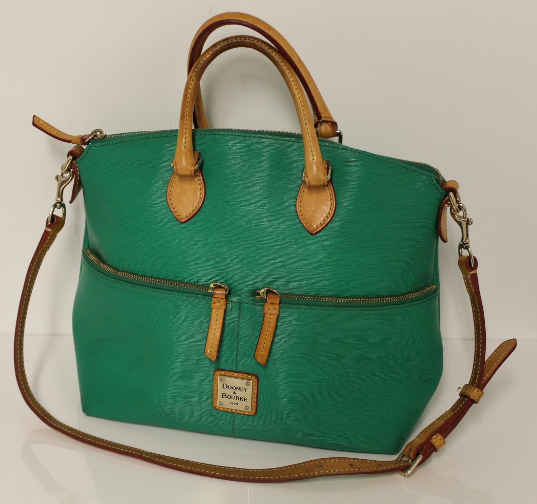 Dooney and Bourke Green Leather Handbag: Zippered top with two zippered exterior pouches, 4 interior pouches. Approximately 15.5 x 7"
