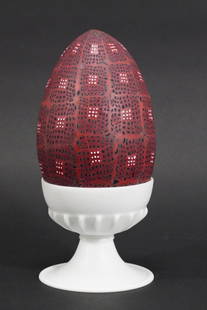 Richard Marquis Egg Sculpture Pilchuck Artist: Two part egg and egg cup hand blown glass sculpture. Egg comprised of Marquis' designed murrines with red ground and black and white spots. Cup in opaque white glass in the "mezzo stampo" technique (i