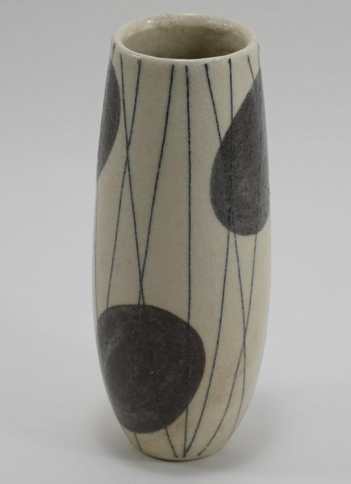 Mid Century Japanese Pottery Ikebana Vase: Hand formed vase with mod abstract cirlcle and line design. Thick claze with craquelure. No apparent artist stamp. 9.5" H.
