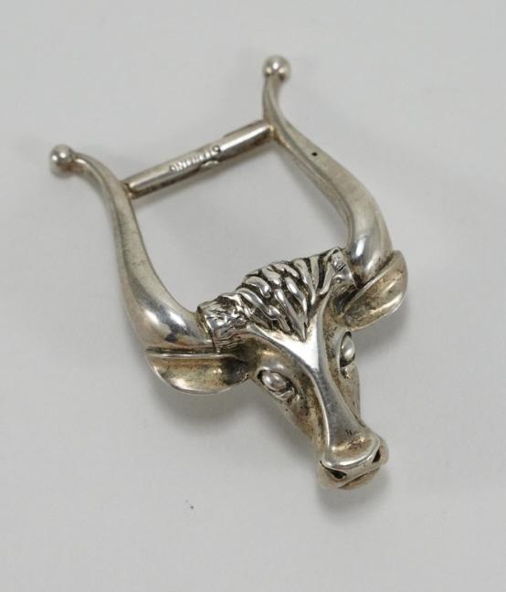 Southwest Style Cleo-Del Sterling Buckle: Longhorn bull head sterling belt buckle. Marked 1947 CLEO DEL PAT APPL'D FOR and STERLING. Detailed casting with aged patina. 18 grams approx. 2.25" x 1.25".