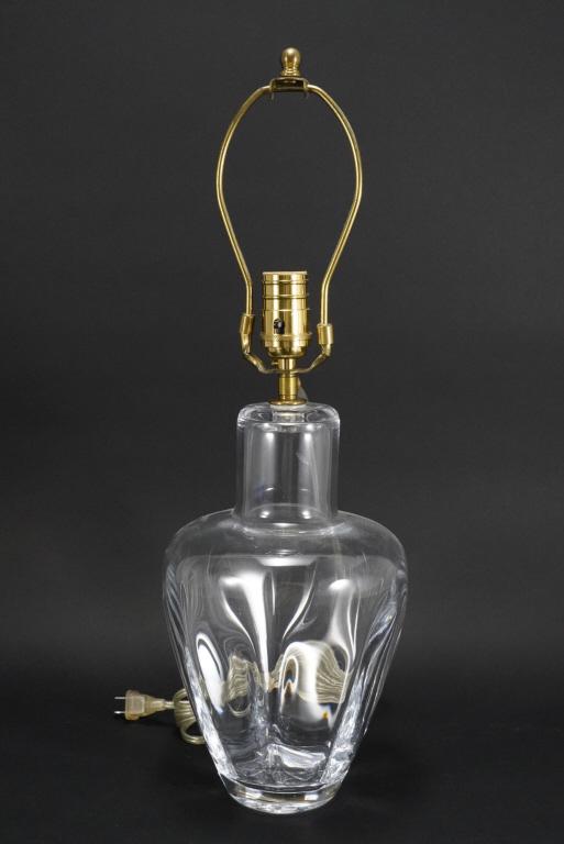 Simon Pearce Glass Table Lamp: Hand blown glass with acid etched Simon Pearce mark to bottom. Brass electrical fittings. Excellent condition; working. Glass base 11.5" H approx. Total height with finial 21.5" approx.
