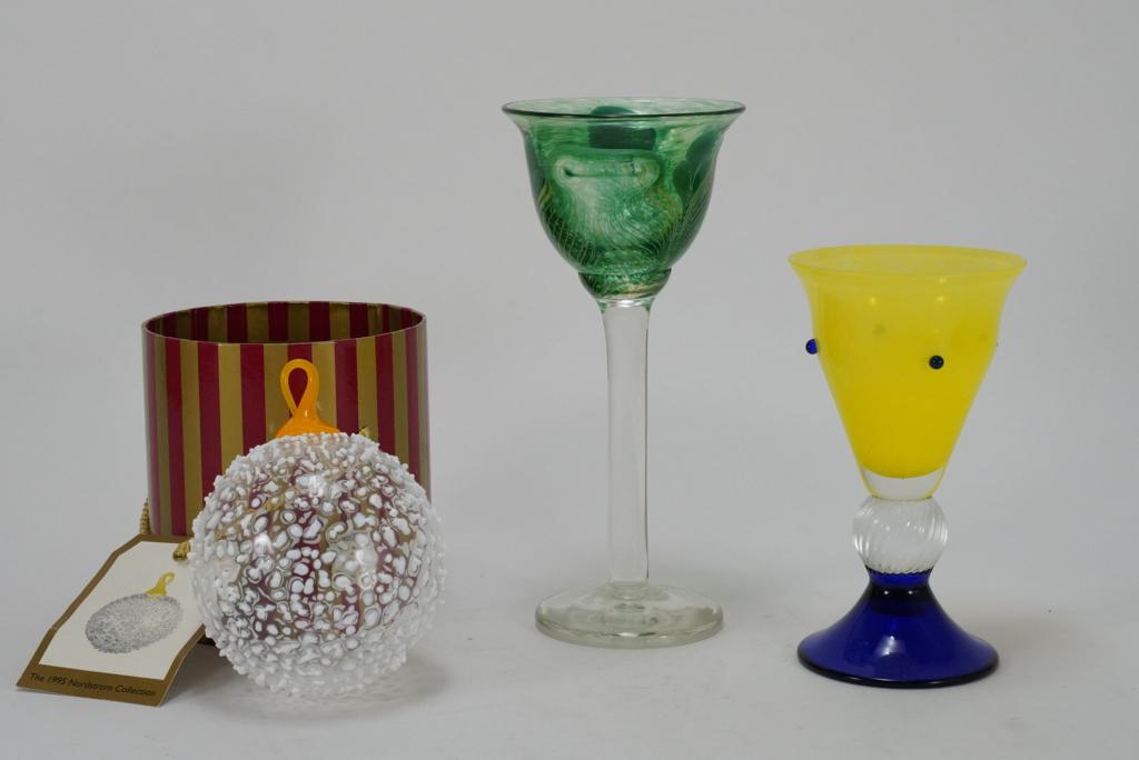 George Jercich & David Levi NW Art Glass: (1) George Jercich art glass goblet. Engraved signature to base; circa 1970's. Provenance: Anne Gould Hauberg collection. 8.5" H. (2) David Lee "snowball" ornament made for the1995 Nordstrom Collectio