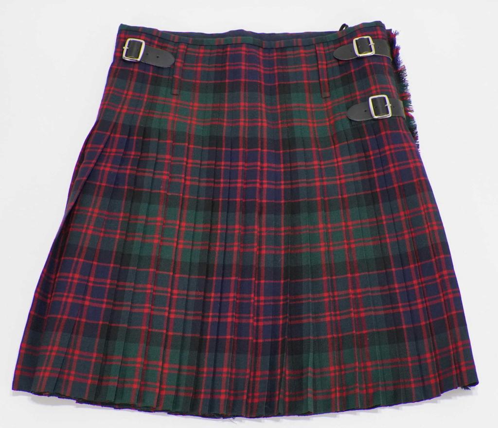 Lochcarron Wool Tartan Kilt: Pleated red, green, and black tartan kilt with three black leather belt and buckle adjustments. LOCHCARRON 100% Pure New Wool Supreme Kilt Fabric Woven in Scotland label. Waist 37 Hip 40 L 23+2R, Marc