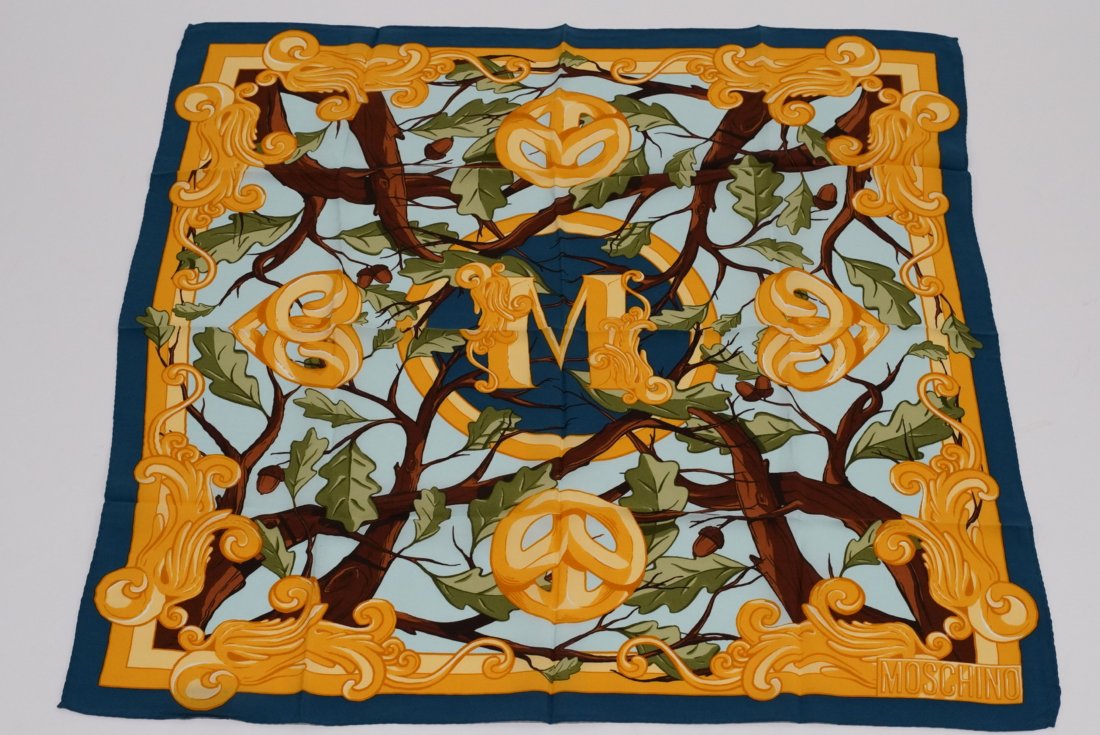 Moschino Small Silk Scarf: Tree branch motif with gold hearts and peace signs. Hand rolled and stitched edges. Original Made in Italy tags. Excellent condition with no apparent snags, pulls, damage, etc. 25.5" x 25" approx.