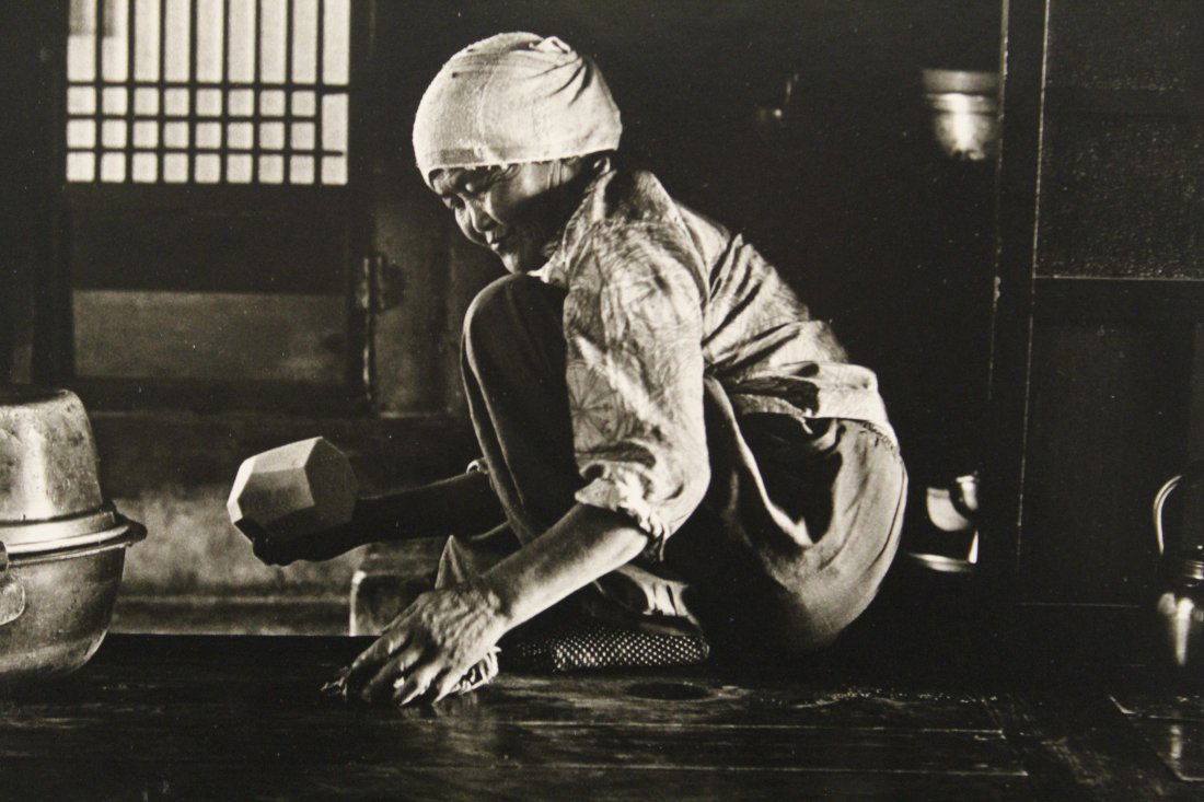 Reesa Tansey Gelatin Silver Print Photograph: "Doing Good Works", Tong Do Hermitage, Korea, 1977. Dry mounted to mat board; pencil signed lower right, and stamped (with title in pencil) to reverse. Excellent condition. Image 9" x 13.5". Backing m