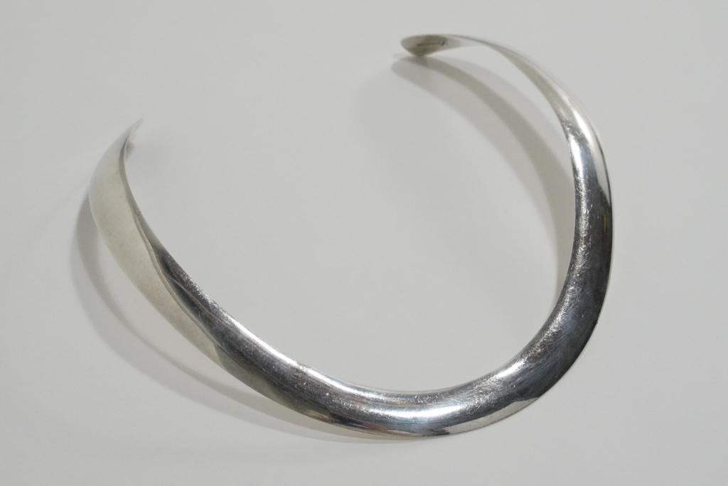 Leonard Schmallie Navajo Sterling Necklace: Handmade 1/2" wide choker style sterling necklace with open back. Marked L SCHMALLIE STERLING. Excellent condition. 56 grams approx. 5 1/4" x 5 1/4" approx.