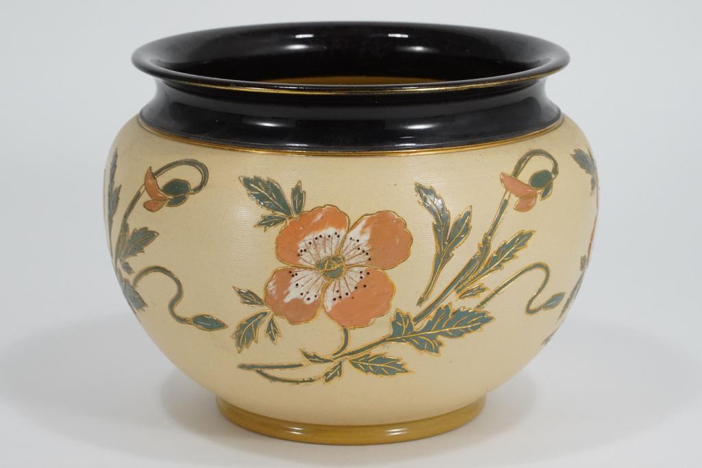 Lovatts Langley England Pottery Jardiniere: Art Nouveau incised floral design on finely ribbed body. Impressed marks to base. Excellent condition with some areas of minor gilt wear. 7.5" H x 9" lip dia. approx.