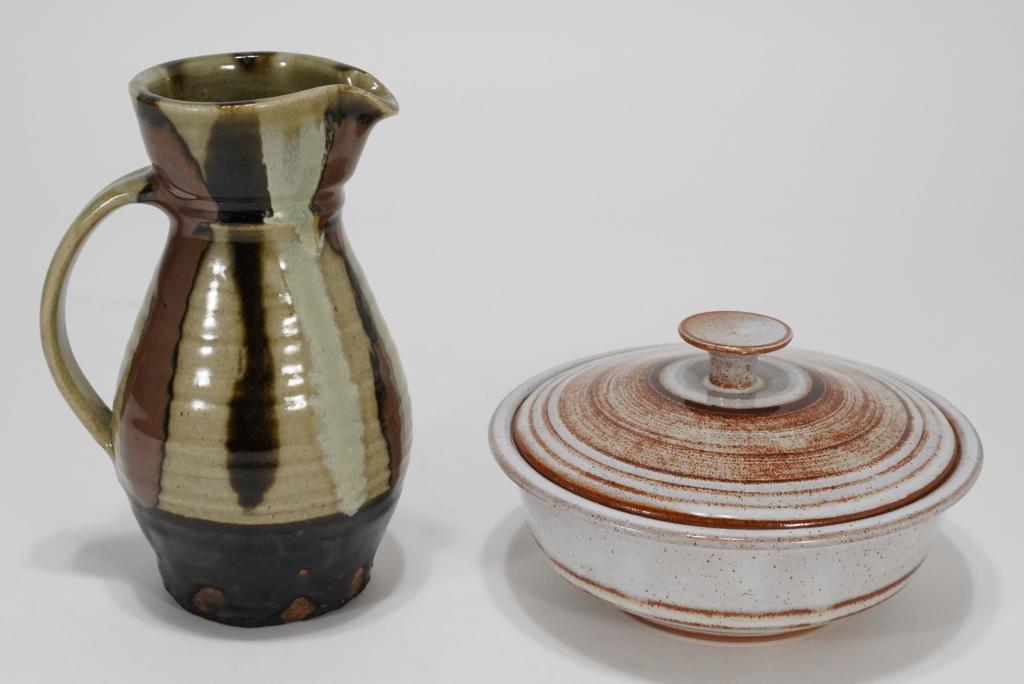 Shoji Hamada Style Pottery Pitcher / Lidded Bowl: (1) Mid century Japanese Shoji Hamada style hand formed pottery pitcher with thick drip glaze. No apparent maker's mark. Excellent condition. 8 3/8" H. (2) Design-Technics style lidded pottery bowl. I