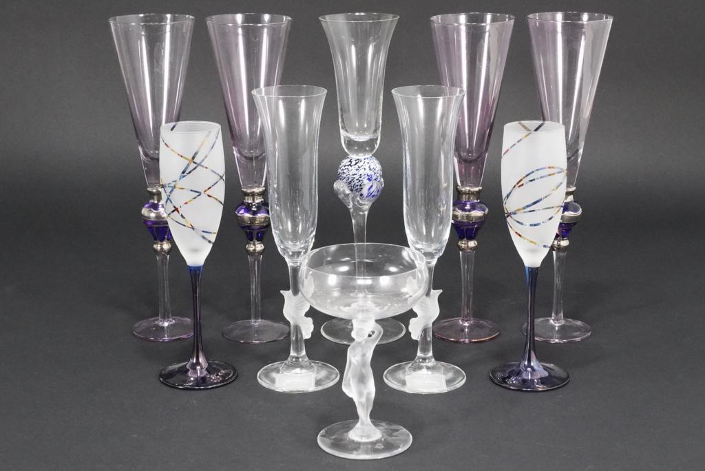Bayel Gorham & Art Glass Champagne Glasses: (1) Bayel France glass with etched nude woman stem. Original label. 5/75" H. (2) Pair Gorham dove flutes with originl labels. 10" H. (3) Czech Republic hand blown art glass flute with white and blue b