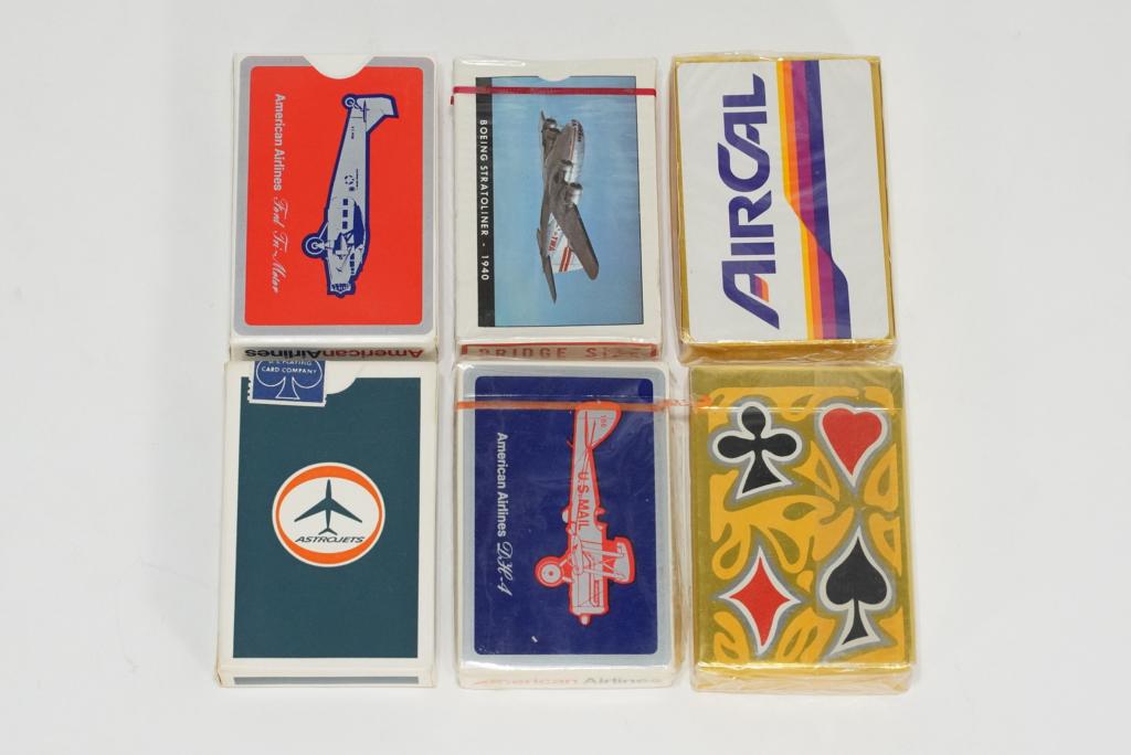 Vintage Airline Playing Card Decks: Includes three sets for American Airlines (two unopened), one set for TWA Airlines with Boeing Stratoliner 1940 (unopened), and two sets for Air Cal airlines with mod design (unopened). 6 playing card