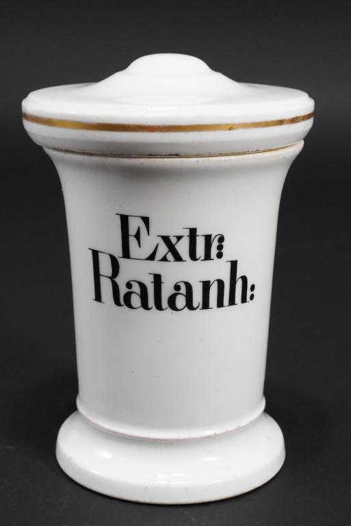 Antique French Porcelain Apothecary Jar: White porcelain lidded jar with hand enameled "Extr: Ratanh:" to the front. Excellent condition. 5.75" H x 4" lid dia.