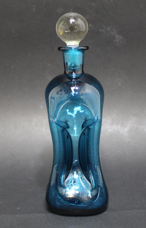 Mid Century Hand Blown Decanter Bottle: Turquoise blue glass with clear glass stopper. Excellent condition. 11" H approx.