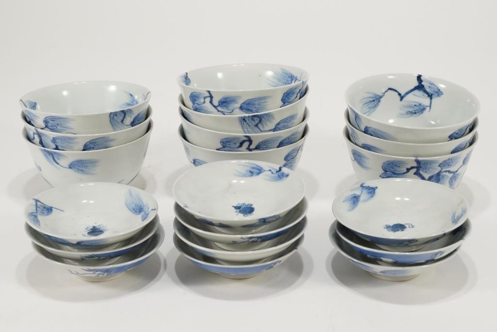 Imari Arita Blue & White Porcelain Covered Bowls: Matched set of 10 bowls and lids hand decorated with a scholar and wind swept tree design. No marks; circa Meiji period. All excellent condition. Bowls 2 3/4" H x 5" D. Lids 1 1/4" H x 4 1/2" dia.