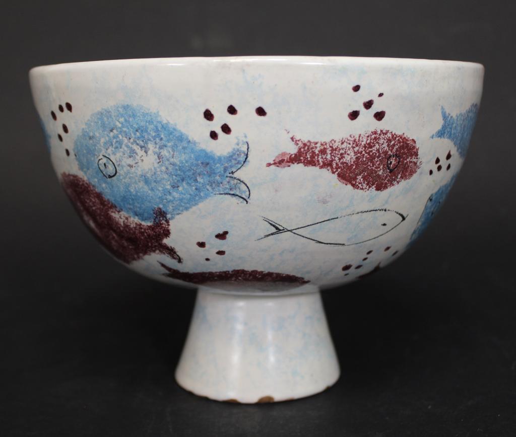 Mid Century Italian Pottery Footed Bowl: Hand decorated with fish and bubble design. Marked c 292/24 Italy. Small lip chip and some glaze flakes / chips along foot edge. Mid 20th C. 5 5/8" H x 7 3/4" dia.