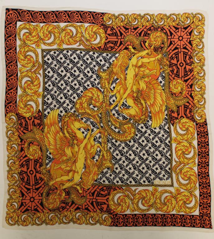 Escada Silk Scarf: Versace style Pegasus and Bellerophon motif. Rolled and stitched edges. Very good condition; two tiny pin holes to upper left corner and lower right corner. 34" x 32" approx.