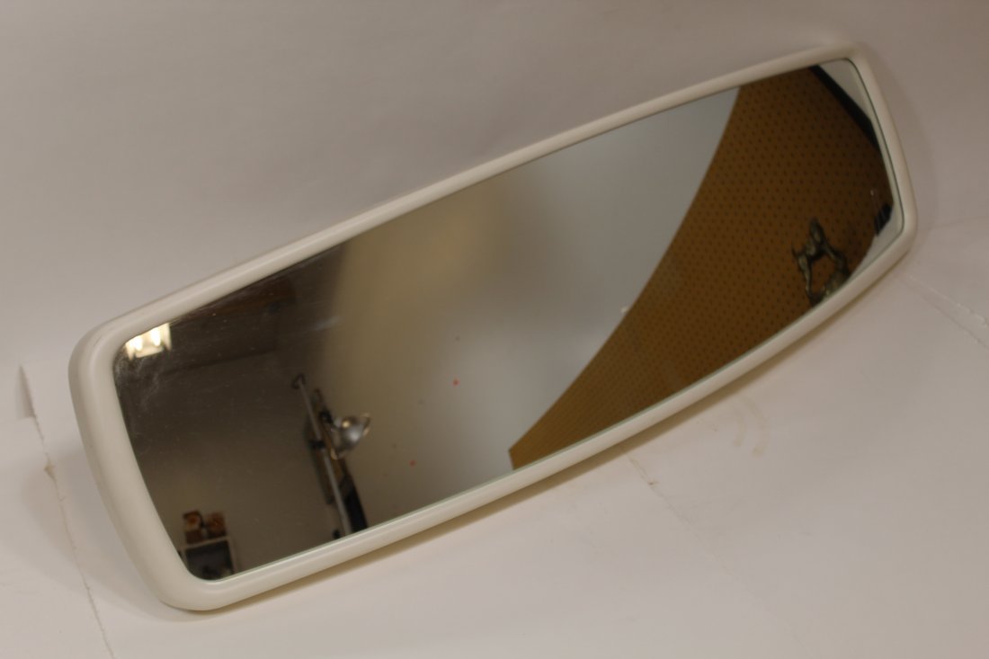 Established & Sons Convex Mirror Sebastian Wrong: Design based on automobile rear view mirror. White frame with sliding and swivel wall mount bracket. Good condition. 35.5" X 9.75". Wall mount bracket 6.75".