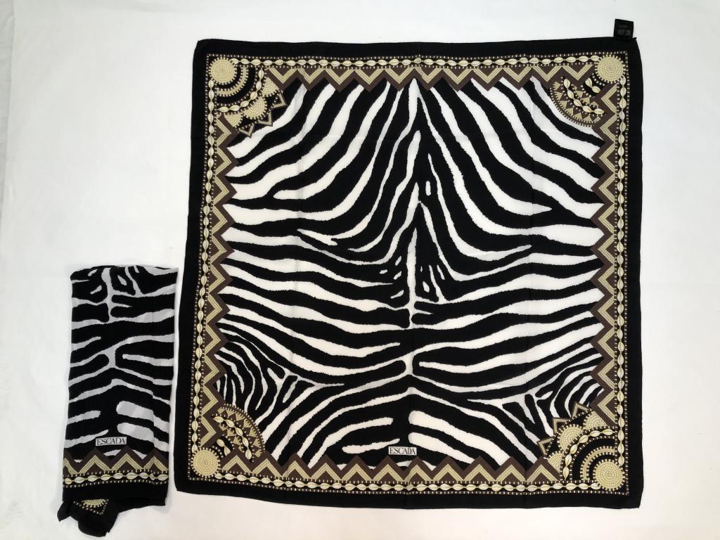 Pair Escada Zebra Stripe Silk Scarves: Matched pair zebra print scarves. Original Made in Italy labels. Rolled and stitched edges. Both very good condition; tiny pin hole near center to one scarf. 34.5" x 34" approx.