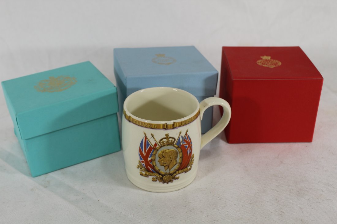 English Royal Commerative Cups: Includes 1935 George Silver Jubilee mug by Meakin and 3 boxed The Royal Collection bone china cups: Buckingham Palace (3" H 3 3/8" dia.), The Queen's 80th birthday 2006 (3 1/8" H x 3 1/4" dia.), and t