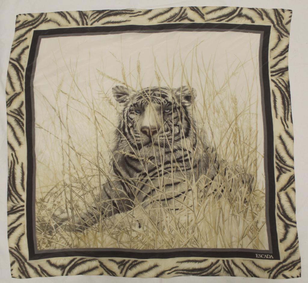 Escada Silk Tiger Scarf: Tiger in grass design. Rolled and stitched edges. Very good condition; one tiny pin hole lower left corner. 32" x 34" approx.