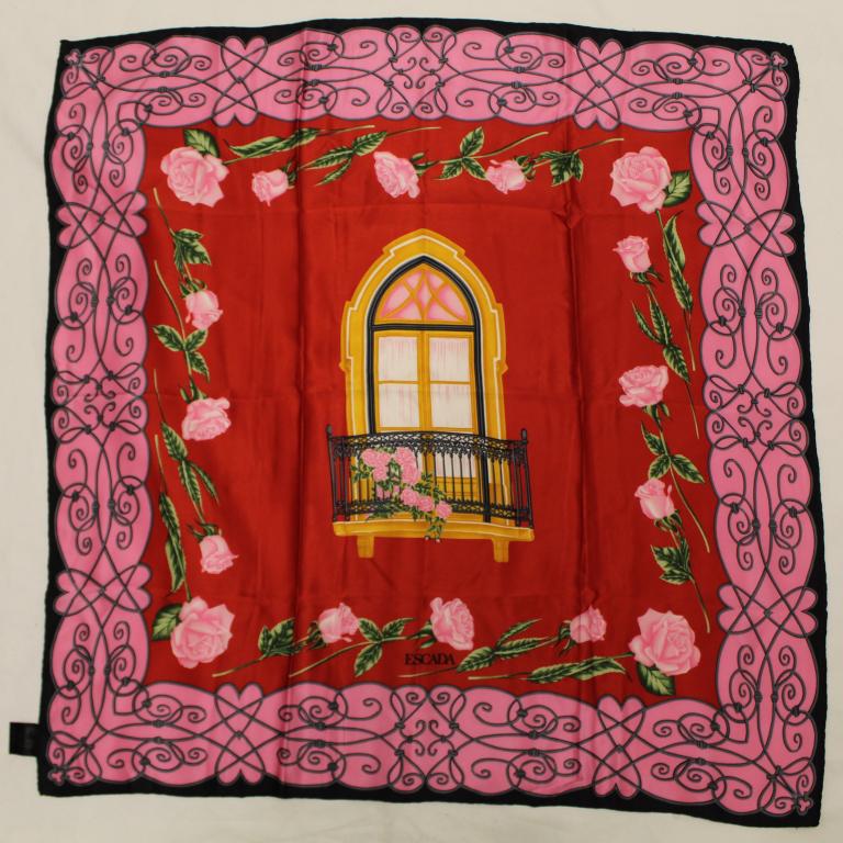 Escada Silk Scarf: Window and rose design with "iron work" border. Hand rolled and stiched edges. Original Made in Italy label. Very good condition with no apparent spots, pulls, holes, etc. 33.5" x 33.5" approx.