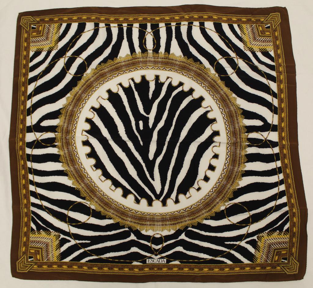 Escada Silk Zebra Stripe Scarf: Zebra stripe design with African "basket weave" motif borders. Rolled and stiched edges. Very good condition with no apparent spots, pulls, holes, etc. 33" x 34.5" approx.