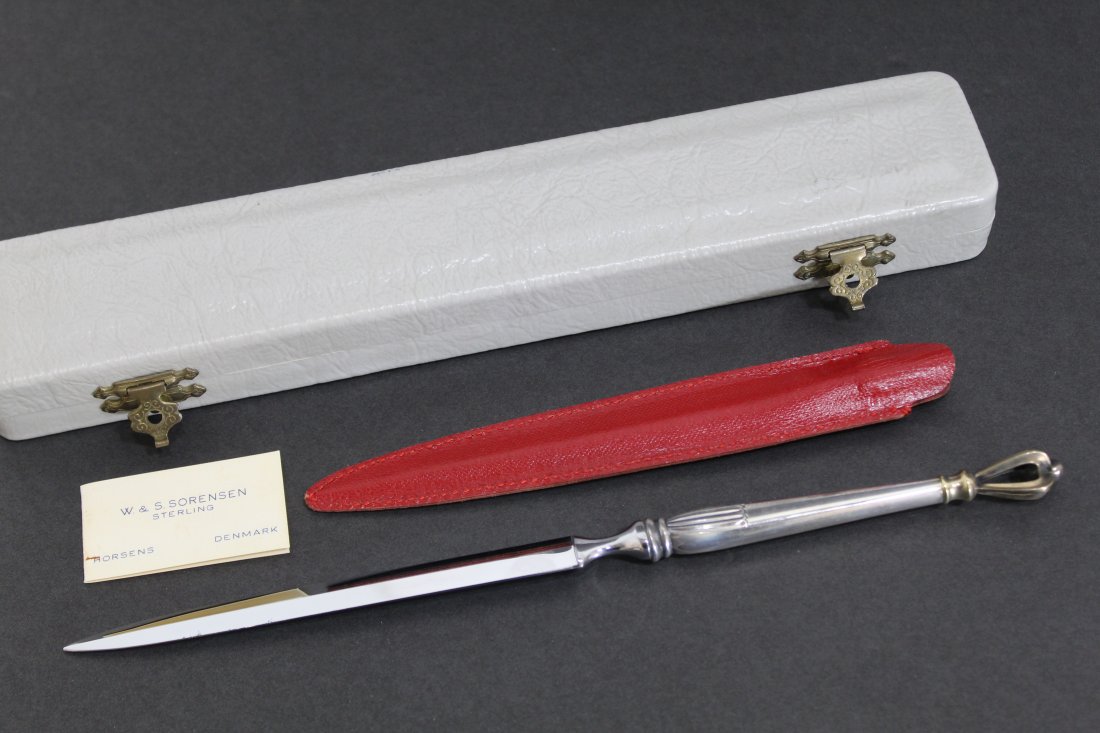 Sterling Letter Opener Swedish American Line: Marked W & S SORENSON STERLING DENMARK. Includes original box and red leather sheath. Like new unused condition. Mid 20th C. Letter opener 9.25" L.