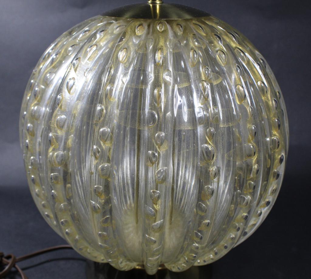 Murano Bullicante Aventurine Glass Lamp: Ribbed globe form in clear glass with vertical controlled bubbles and gold leaf; possibly Barovier & Toso. Original electrical fittings and base. RAYMOR MFG. DIV. paper label inside socket cover. Exce