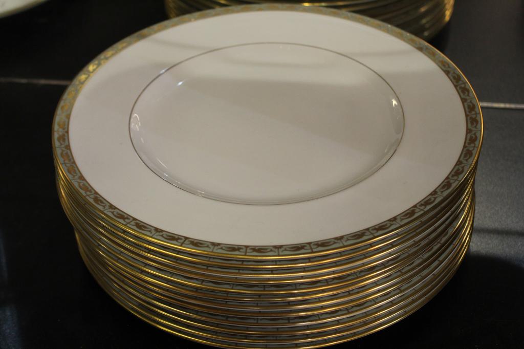 Wedgwood Bone China MARINA Dinner Plates: Set of 12 Marina pattern 4426 dinner plates. Neoclassical / Regency style gilt fishtail griffin design over pale green border. Black Portland vase marks. Produced 1969-1972. All in excellent condition
