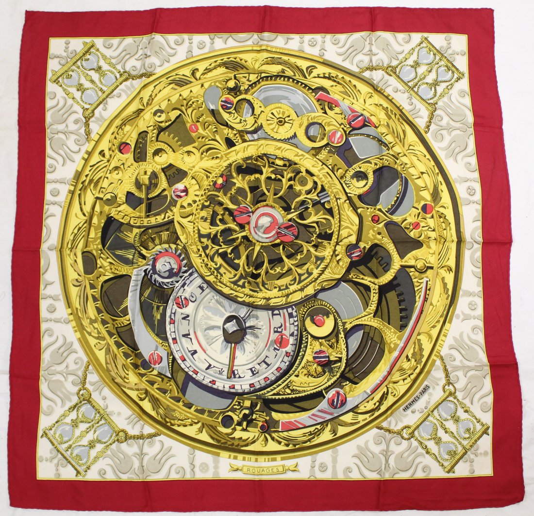 Hermes Rouages Silk Scarf: Designed by Francois Heron. Hand rolled and stitched edges. Small spot lower right border corner; otherwise very good condition. 34" x 33" approx.