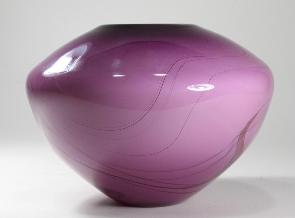 Dan Bergsma Studio Art Glass Vase: Amethyst glass with swirls; white interior. Etched signature to bottom with 280C notation. Excellent condition. 7.25" x 10.25" dia. approx.